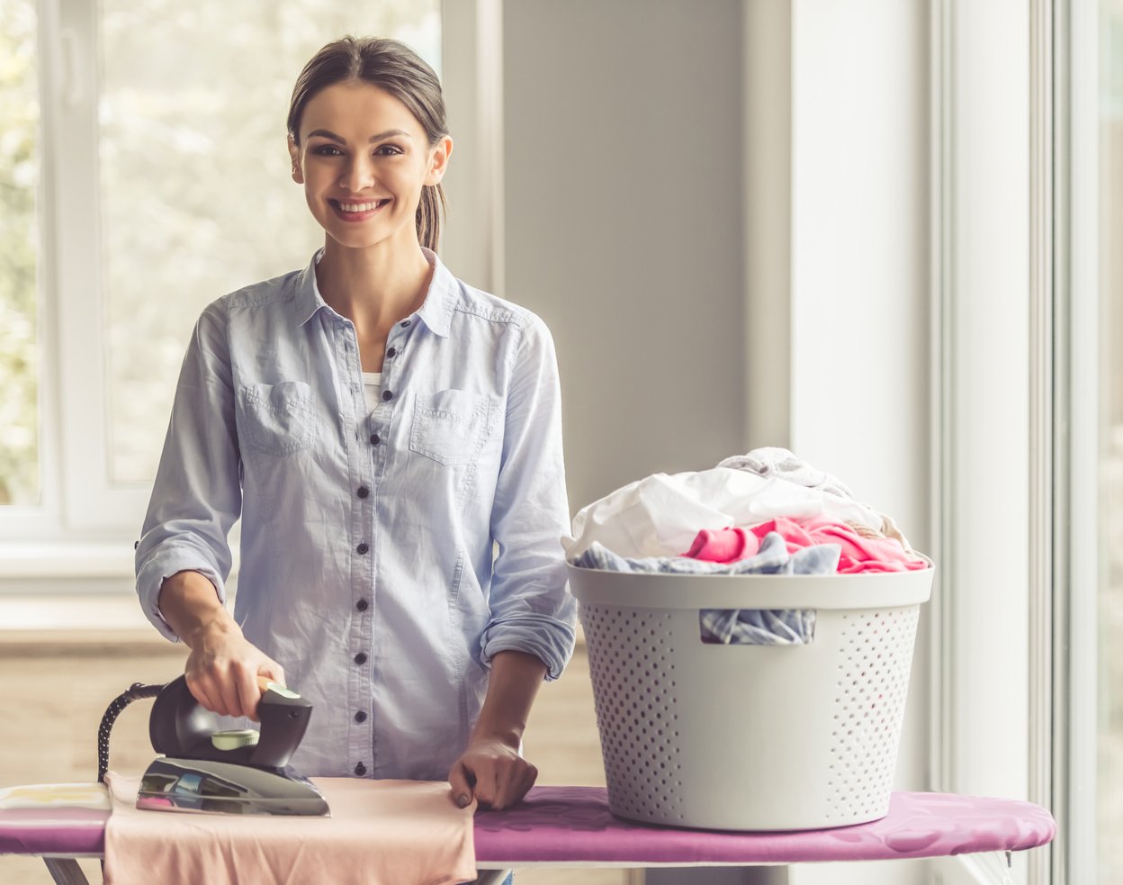 Woman ironing clothes